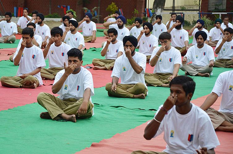 NCC CADETS PERFORM YOGA in GADVASU on “International Yoga Day on 21st June, 2015