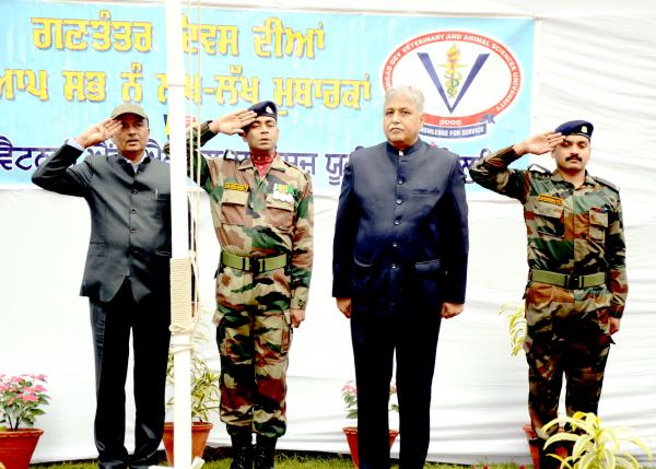 Dr. Inderjeet Singh, Vice Chancellor, Dr. Satyavan Rampal, DSW-cum-Estate Officer and R&V Sqn. NCC  officers saluting the National Flag on Celebration of Republic Day on 26-1-2023